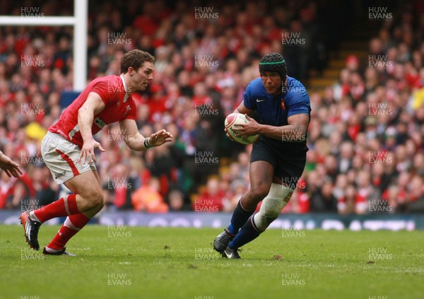 170312 Wales v France - RBS 6 Nations Championship - France's Thierry Dusautoir takes on Wales' George North