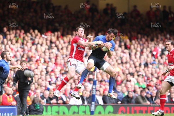 170312 - RBS Six Nations 2012 - Wales v France -France's Clement Poitrenaud wins the high ball against Wales' Alex Cuthbert