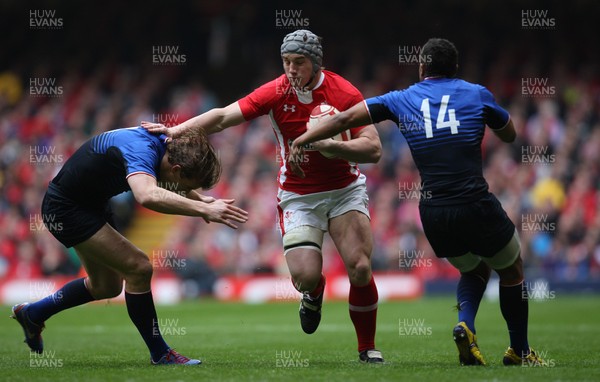 170312 -  Wales v France, RBS 6 Nations - Wales' Jonathan Davies is tackled by France's Aurelien Rougerie and France's Wesley Fofana 