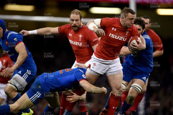 170318 - Wales v France - NatWest 6 Nations -  Hadleigh Parkes of Wales is tackled by Geoffrey Doumayrou of France  