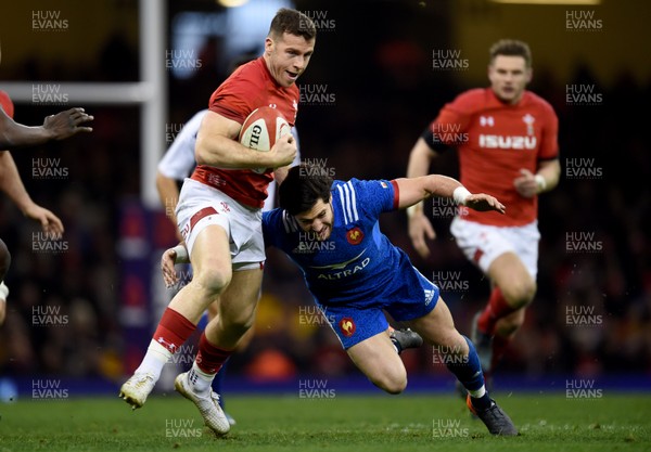 170318 - Wales v France - NatWest 6 Nations -  Gareth Davies of Wales is tackled by Maxime Machenaud of France 