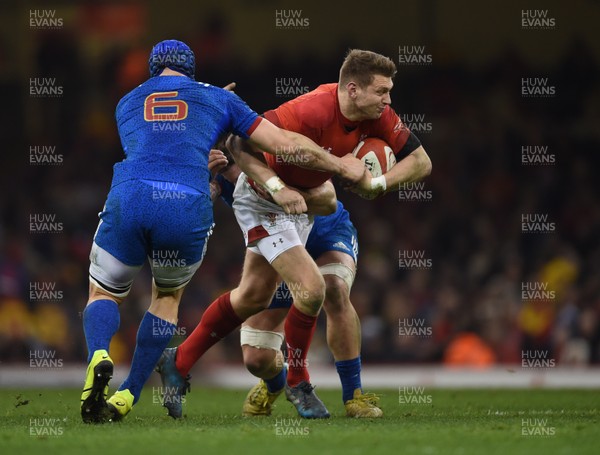 170318 - Wales v France - NatWest 6 Nations -  Dan Biggar of Wales is tackled by Wenceslas Lauret and Marco Tauleigne of France 