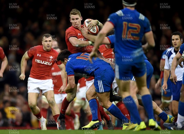 170318 - Wales v France - NatWest 6 Nations -  Liam Williams of Wales is tackled by Francois Trinh-Duc of France 