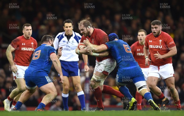 170318 - Wales v France - NatWest 6 Nations 2018 - Alun Wyn Jones of Wales is tackled by Wenceslas Lauret of France