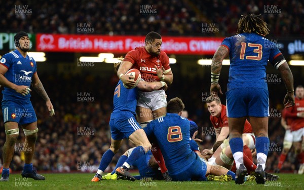 170318 - Wales v France - NatWest 6 Nations 2018 - Taulupe Faletau of Wales is tackled by Maxime Machenaud and Marco Tauleigne of France