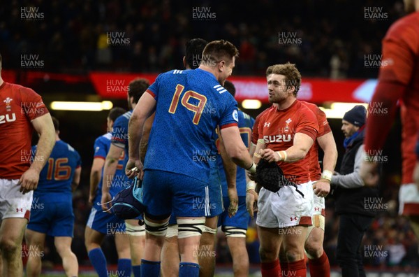 170318 - Wales v France - NatWest 6 Nations 2018 - Bernard Le Roux of France and Leigh Halfpenny of Wales at the end of the game