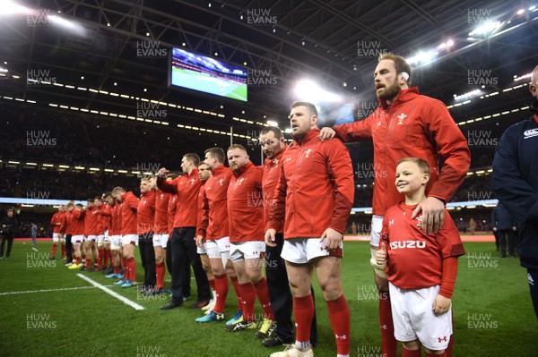 170318 - Wales v France - NatWest 6 Nations 2018 - Alun Wyn Jones and mascot line up for the anthems