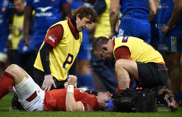 170318 - Wales v France - NatWest 6 Nations 2018 - Physio Mark Davies and Doctor Geoff Davies treat Scott Williams