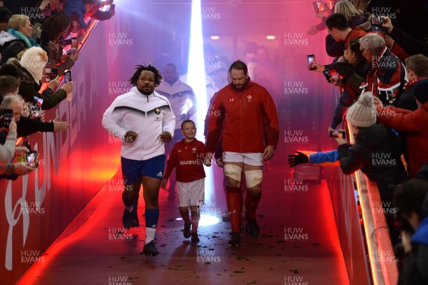 170318 - Wales v France - NatWest 6 Nations 2018 - Alun Wyn Jones leads out his side with mascot