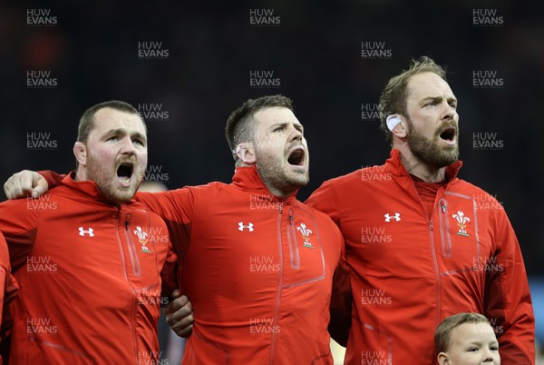 170318 - Wales v France - Natwest 6 Nations Championship - Ken Owens, Rob Evans and Alun Wyn Jones of Wales sing the anthem
