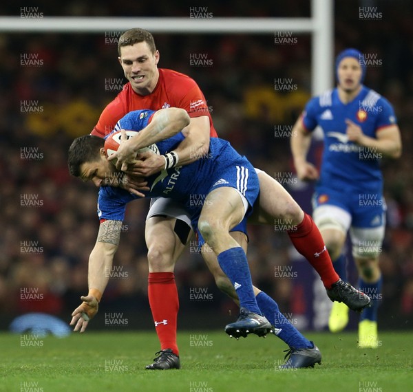 170318 - Wales v France - Natwest 6 Nations Championship - Remy Grosso of France is tackled by George North of Wales