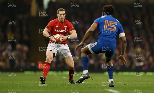 170318 - Wales v France - Natwest 6 Nations Championship - George North of Wales is challenged by Benjamin Fall of France