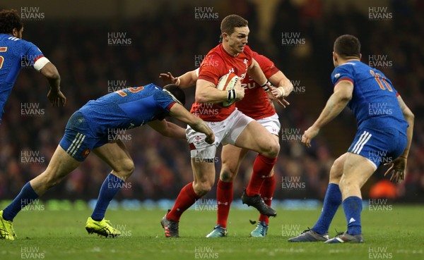 170318 - Wales v France - Natwest 6 Nations Championship - George North of Wales is tackled by Geoffrey Doumayrou of France