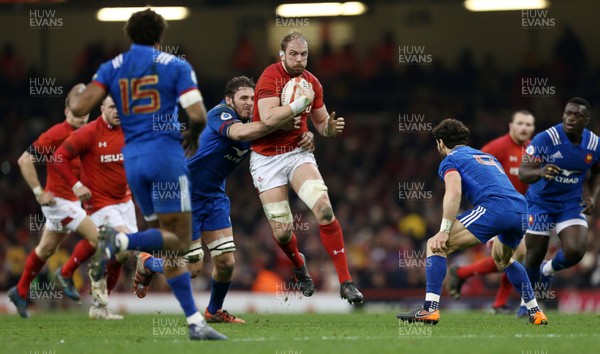 170318 - Wales v France - Natwest 6 Nations Championship - Alun Wyn Jones of Wales is tackled by Paul Gabrillagues of France