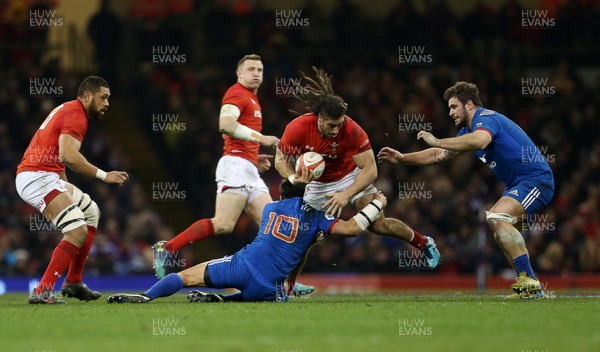 170318 - Wales v France - Natwest 6 Nations Championship - Josh Navidi of Wales is tackled by Francois Trinh-Duc and Marco Tauleigne of France