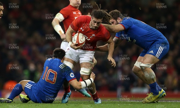 170318 - Wales v France - Natwest 6 Nations Championship - Josh Navidi of Wales is tackled by Francois Trinh-Duc and Marco Tauleigne of France