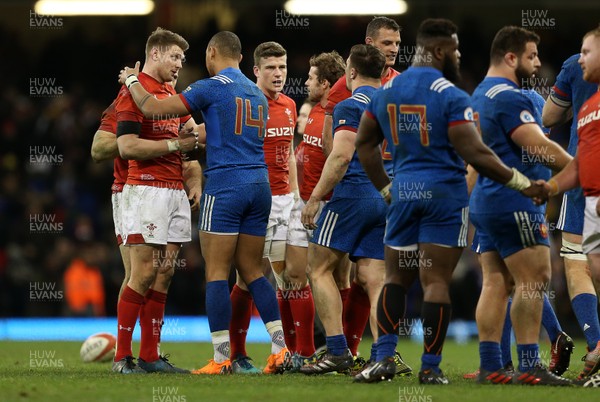 170318 - Wales v France - Natwest 6 Nations Championship - Dan Biggar of Wales shakes hands with Gael Fickou of France