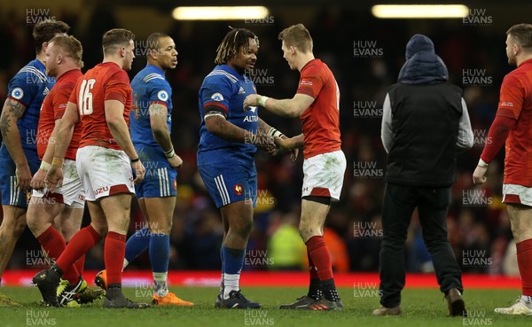 170318 - Wales v France - Natwest 6 Nations Championship - Mathieu Bastareaud of France shakes hands with Liam Williams of Wales