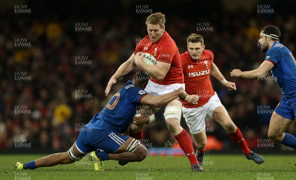170318 - Wales v France - Natwest 6 Nations Championship - Bradley Davies of Wales is tackled by Mathieu Babillot of France