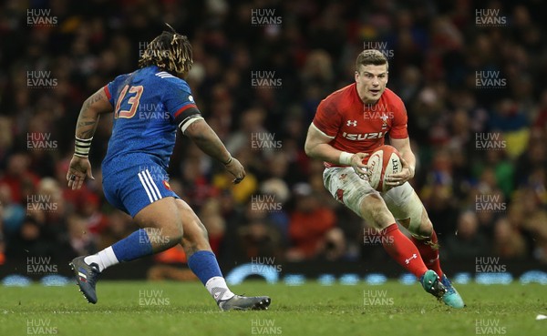 170318 - Wales v France - Natwest 6 Nations Championship - Scott Williams of Wales is challenged by Mathieu Bastareaud of France