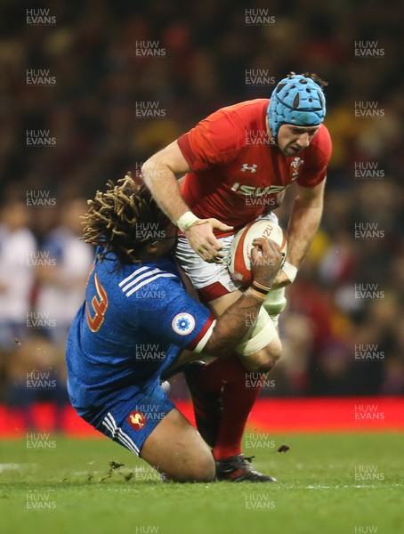 170318 - Wales v France, NatWest 6 Nations 2018 - Justin Tipuric of Wales is tackled by Mathieu Bastareaud of France