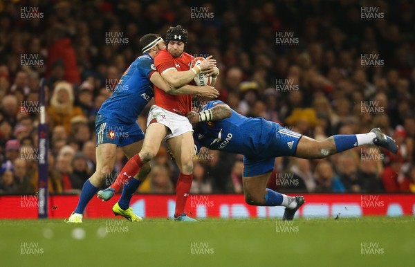 170318 - Wales v France, NatWest 6 Nations 2018 - Leigh Halfpenny of Wales is tackled