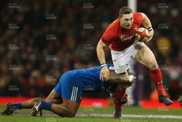 170318 - Wales v France, NatWest 6 Nations 2018 - George North of Wales takes on Jefferson Poirot of France