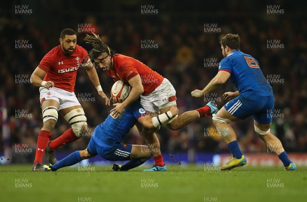 170318 - Wales v France, NatWest 6 Nations 2018 - Josh Navidi of Wales is tackled by Francois Trinh Duc of France  and Marco Tauleigne of France
