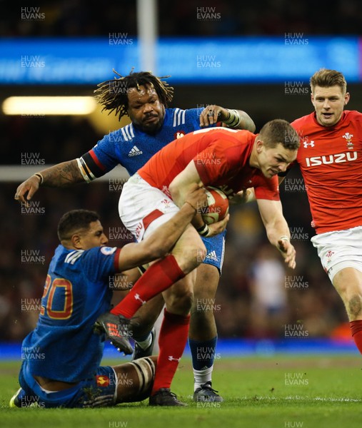 170318 - Wales v France, NatWest 6 Nations 2018 - George North of Wales takes on Mathieu Bastareaud of France and Mathieu Babillot of France