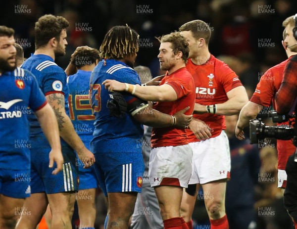 170318 - Wales v France, NatWest 6 Nations 2018 - Leigh Halfpenny of Wales and Mathieu Bastareaud of France  shake hands at the end of the match