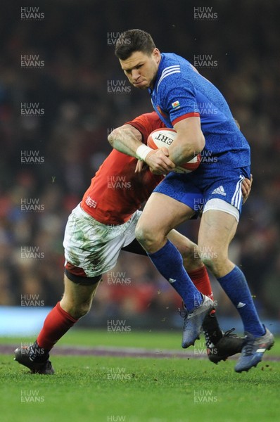 170318 - Wales v France - NatWest 6 Nations Championship - Remy Grosso of France is tackled by Liam Williams of Wales 