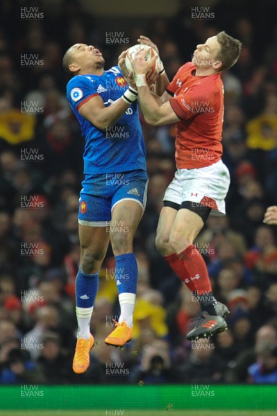 170318 - Wales v France - NatWest 6 Nations Championship - Gael Fickou of France and Liam Williams of Wales  compete for the ball