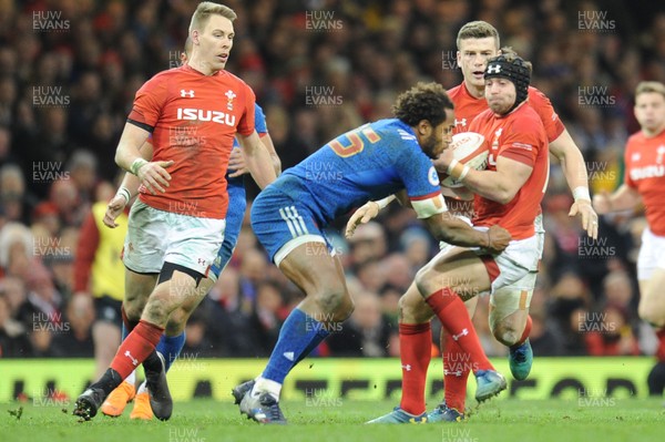 170318 - Wales v France - NatWest 6 Nations Championship - Leigh Halfpenny of Wales is tackled by Benjamin Fall of France 