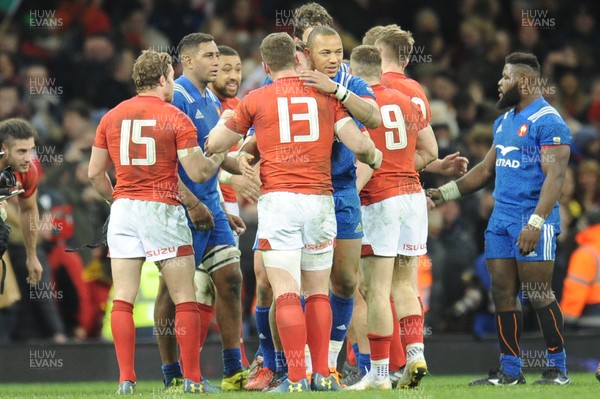 170318 - Wales v France - NatWest 6 Nations Championship - Wales and France players shake hands at the final whistle