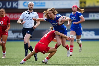 180426 - Wales v France - Guinness Women's Six Nations - Pauline Bourdon Sansus of France is tackled by Jasmine Joyce-Butchers of Wales