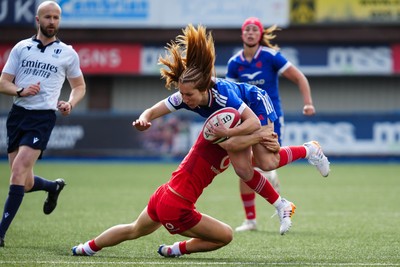 180426 - Wales v France - Guinness Women's Six Nations - Pauline Bourdon Sansus of France is tackled by Jasmine Joyce-Butchers of Wales