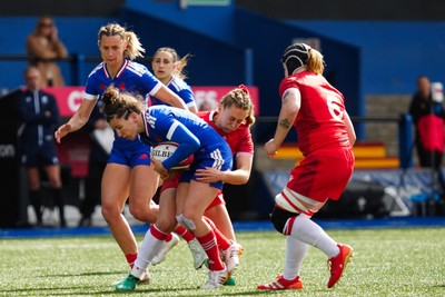 180426 - Wales v France - Guinness Women's Six Nations - Gabrielle Vernier of France is tackled by Carys Cox of Wales