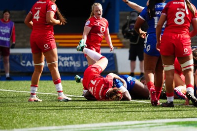 180426 - Wales v France - Guinness Women's Six Nations - Madoussou Fall of France scores her team’s first try whilst under pressure from Carys Cox of Wales