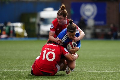 180426 - Wales v France - Guinness Women's Six Nations - Gabrielle Vernier of France is tackled by Lleucu George of Wales and Kate Williams of Wales