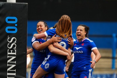 180426 - Wales v France - Guinness Women's Six Nations - Pauline Bourdon Sansus of France celebrates scoring her team’s fourth try with teammates