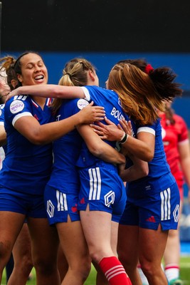 180426 - Wales v France - Guinness Women's Six Nations - Pauline Bourdon Sansus of France celebrates scoring her team’s fourth try with teammates