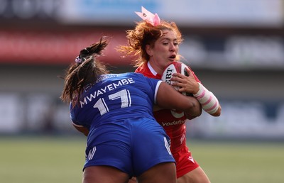 180426 - Wales v France, Guinness Women’s 6 Nations - Georgia Evans of Wales takes on Ambre Mwayembe of France