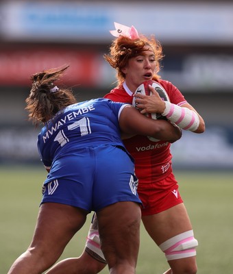 180426 - Wales v France, Guinness Women’s 6 Nations - Georgia Evans of Wales takes on Ambre Mwayembe of France