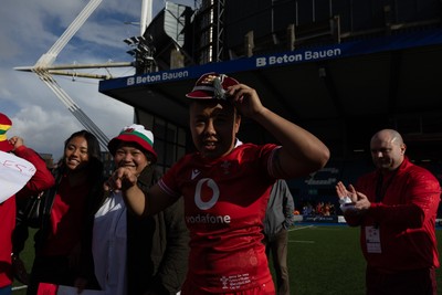 180426 - Wales v France, Guinness Women’s 6 Nations - Sean Lynn, Wales Women head coach presents Jenna De Vera of Wales with her first match cap