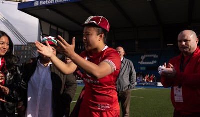 180426 - Wales v France, Guinness Women’s 6 Nations - Sean Lynn, Wales Women head coach presents Jenna De Vera of Wales with her first match cap