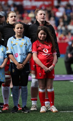 180426 - Wales v France, Guinness Women’s 6 Nations - Wales captain Kate Williams walks out and lines up for the anthem with the match mascot
