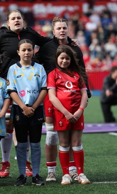 180426 - Wales v France, Guinness Women’s 6 Nations - Wales captain Kate Williams walks out and lines up for the anthem with the match mascot