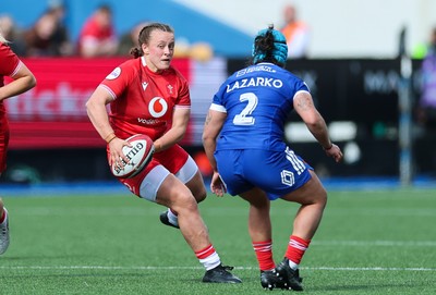 180426 - Wales v France, Guinness Women’s 6 Nations - Lleucu George of Wales takes on Mathilde Lazarko of France 