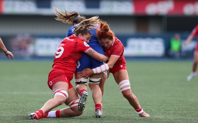 180426 - Wales v France, Guinness Women’s 6 Nations - Natalia John of Wales and Georgia Evans of Wales tackle Axelle Berthoumieu of France 