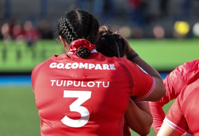 180426 - Wales v France, Guinness Women’s 6 Nations - Sisilia Tuipulotu of Wales with Courtney Keight of Wales at the end of the match